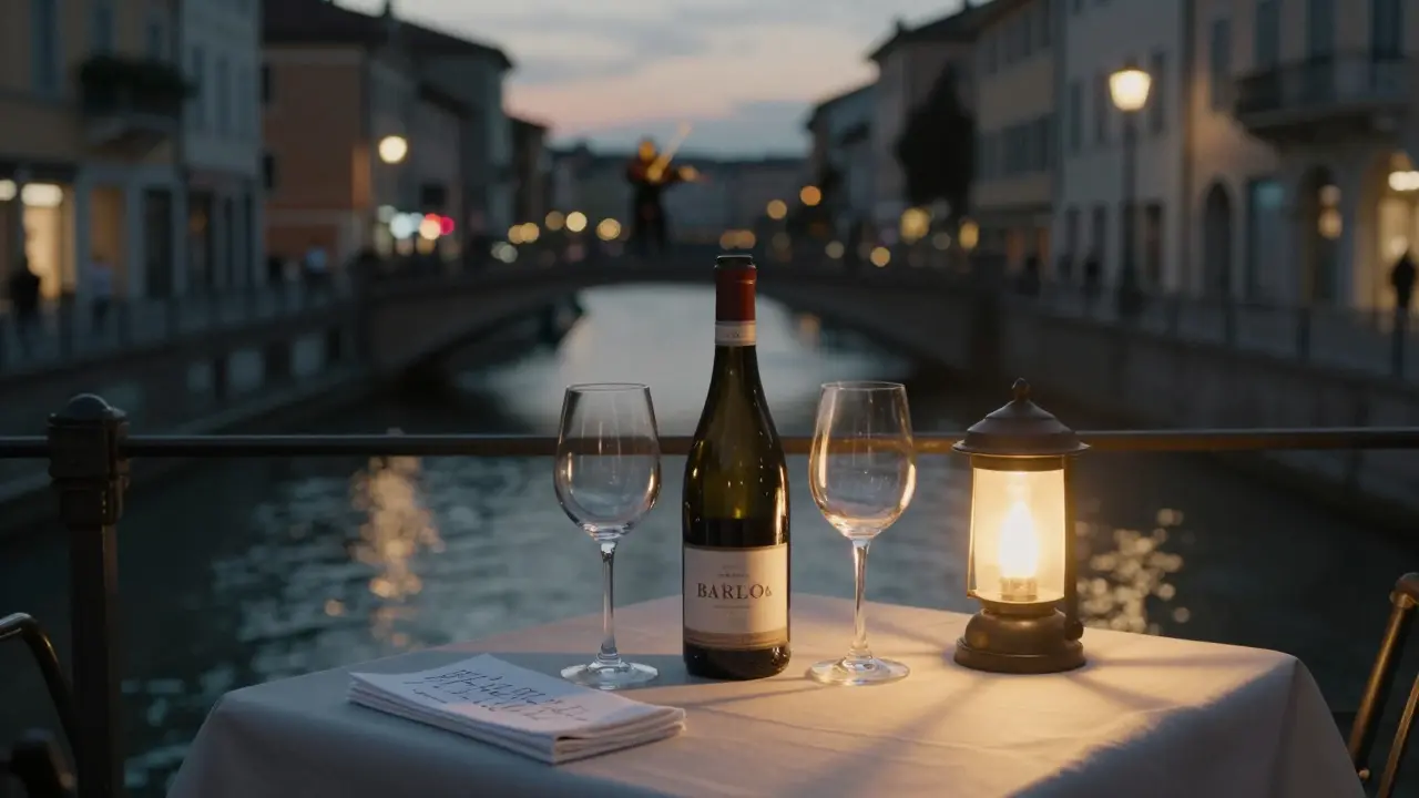Two wine glasses and a bottle of Barolo sit at a quiet canal-side table in Milan at dusk.