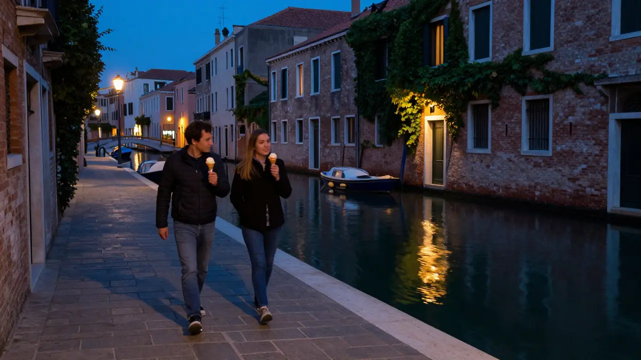 Man and woman walking along the Navigli canal at night with gelato and lantern reflections.